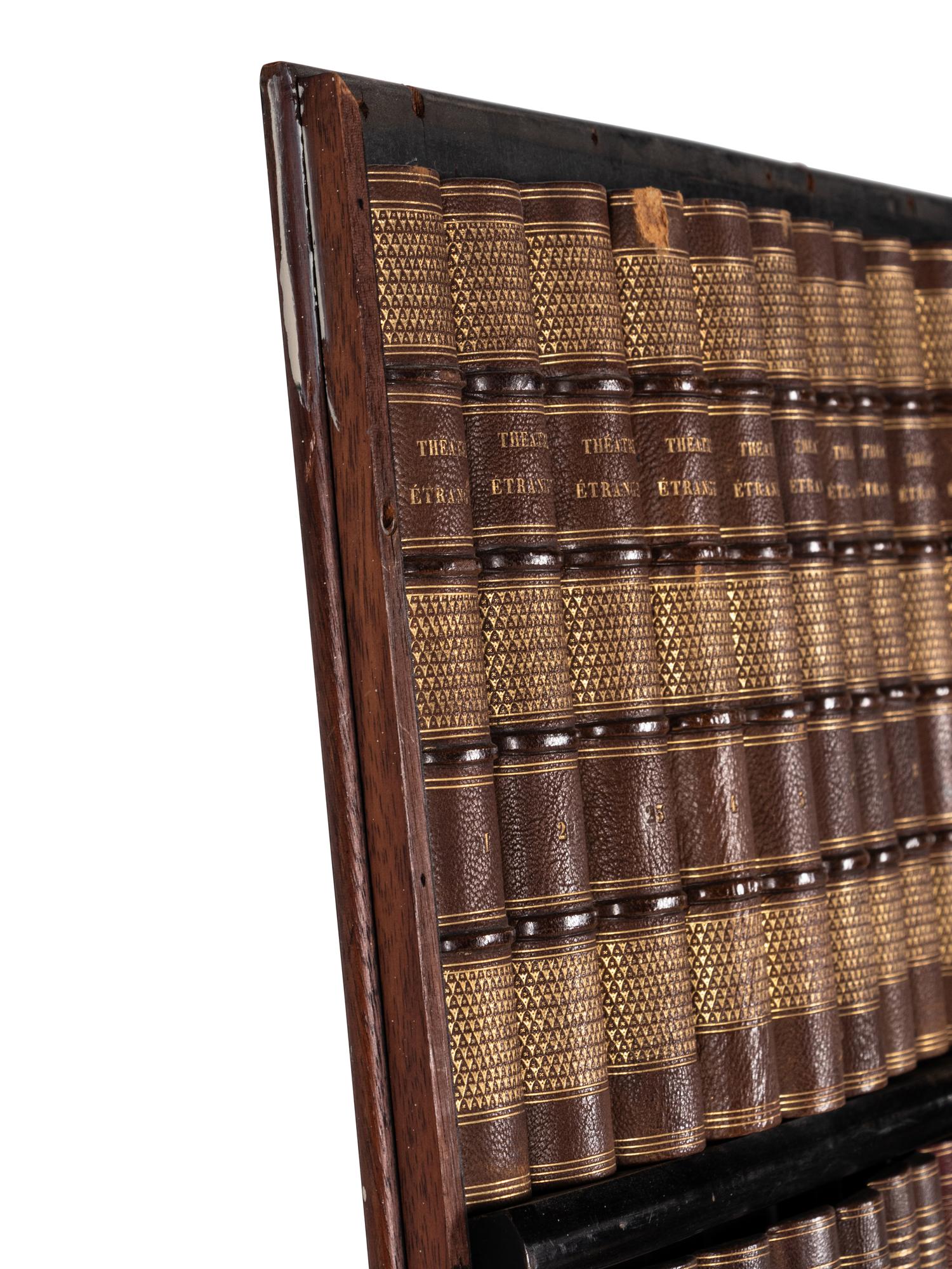 A Pair of Faux Book Wall Panels