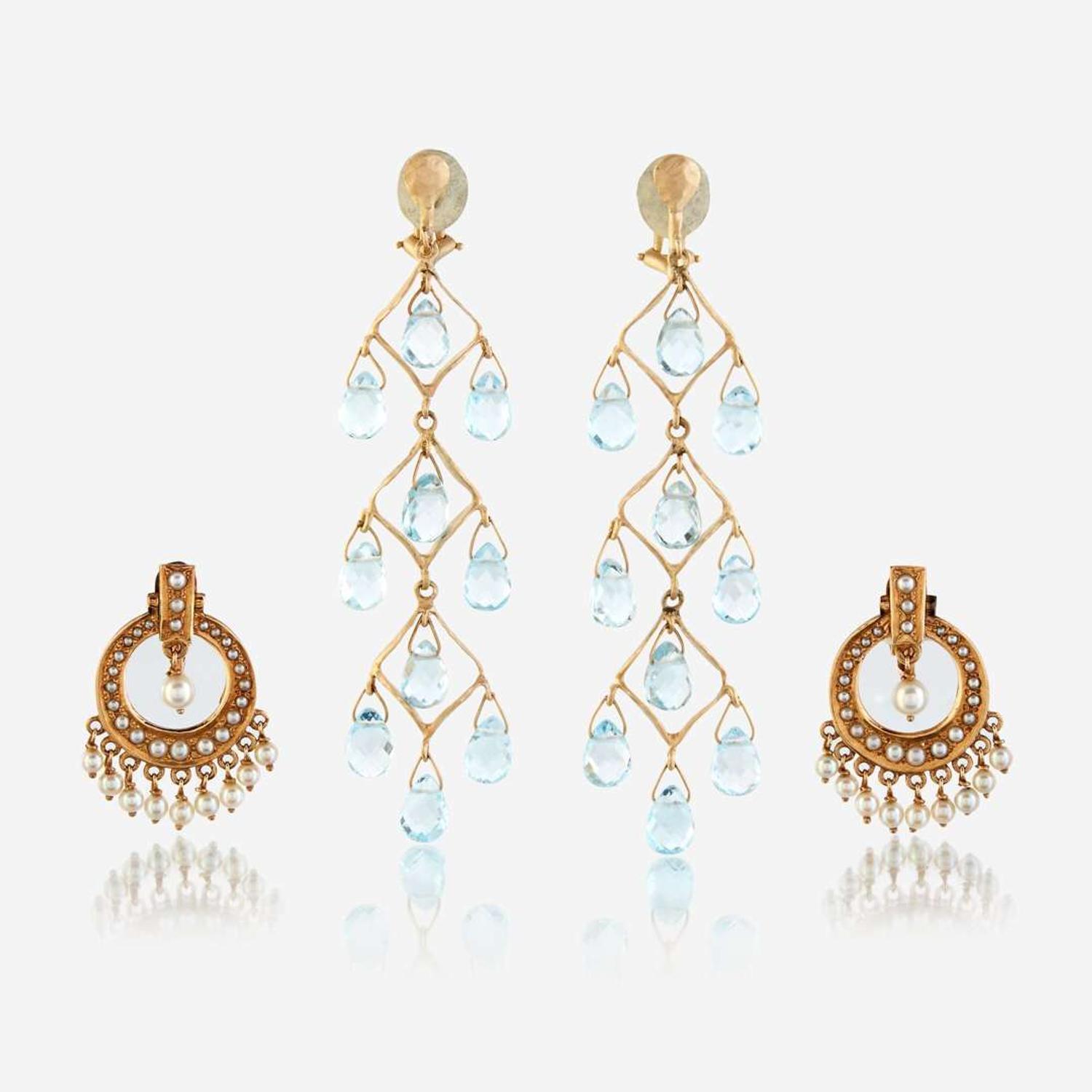 Two pairs of fourteen karat gold and gem-set ear clips
