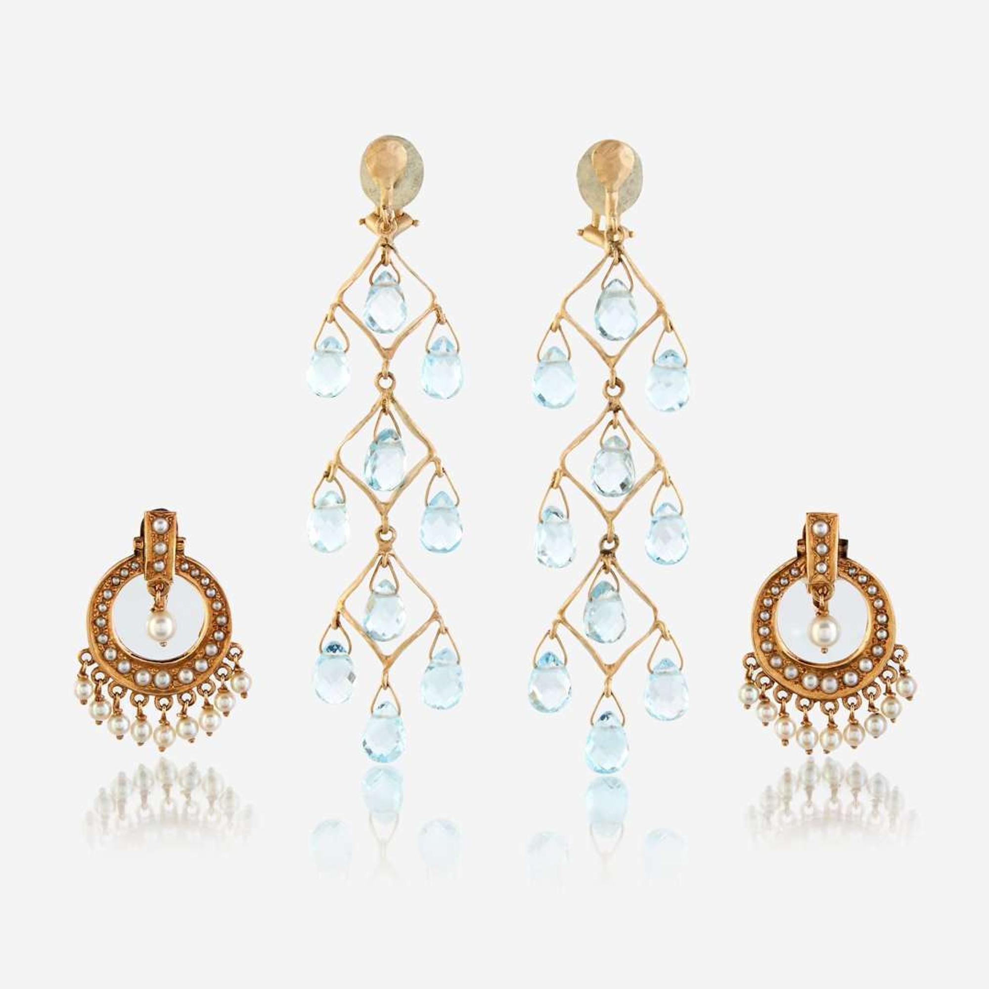Two pairs of fourteen karat gold and gem-set ear clips
