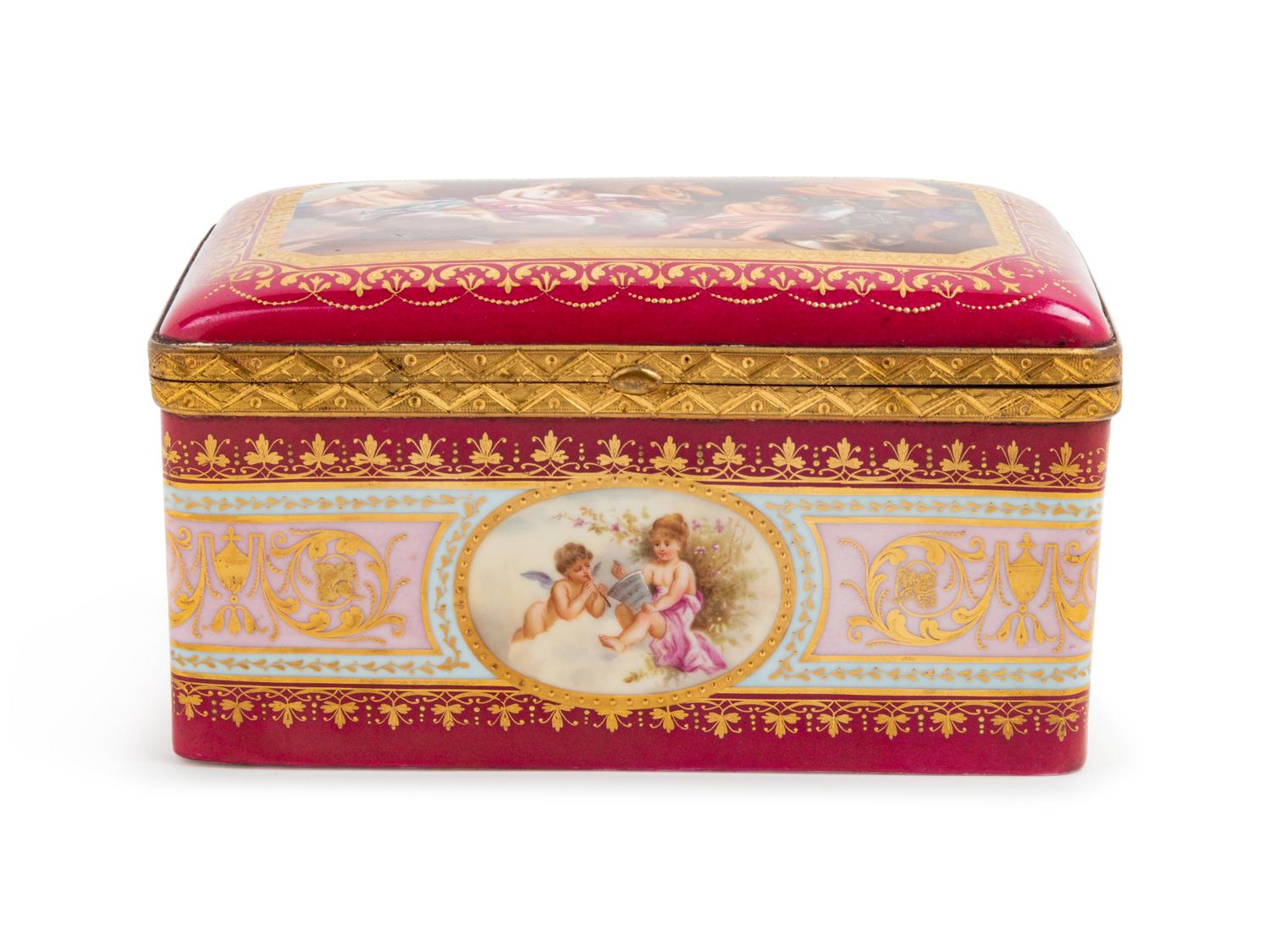 A Vienna Gilt Metal Mounted, Painted and Parcel Gilt Porcelain Table Casket