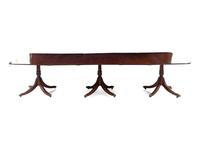 A Regency Style Mahogany Triple-Pedestal Extension Dining Table