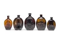 Five Molded Glass Amber Flasks