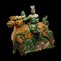 A Large Chinese Sancai Glazed 'Qilin' Roof Tile