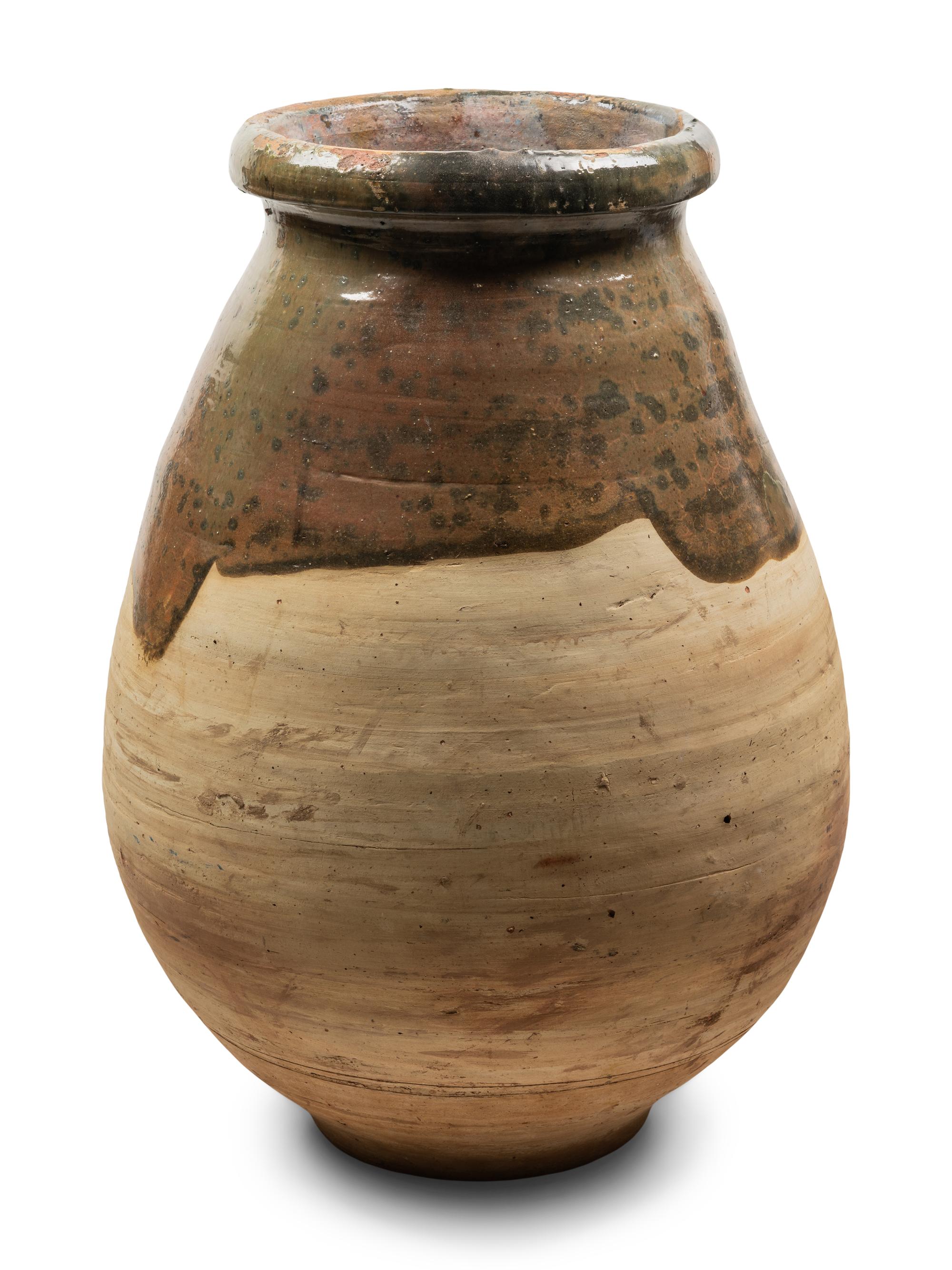 A Slip Glazed Pottery Storage Jar