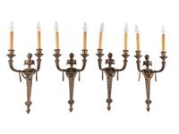 A Set of Four Louis XVI Style Gilt Metal Two-Light Sconces