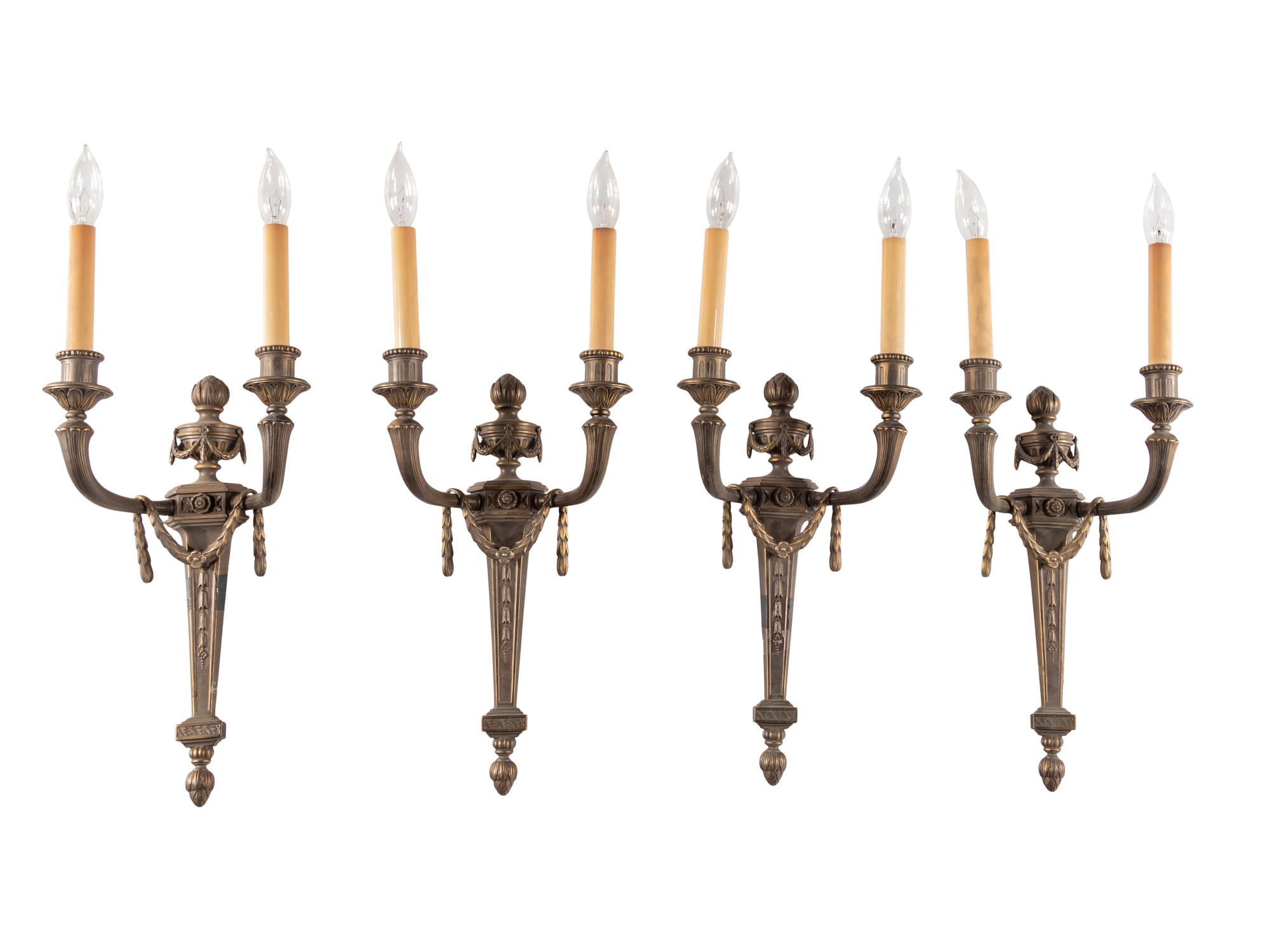 A Set of Four Louis XVI Style Gilt Metal Two-Light Sconces