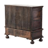A Flemish Paneled and Molded Oak Chest of Drawers