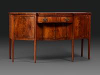 A Federal Fan-Inlaid and Figured Mahogany Serpentine Sideboard
