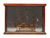 A French Prisoner of War Carved Bone and Wood Model of a British Warship