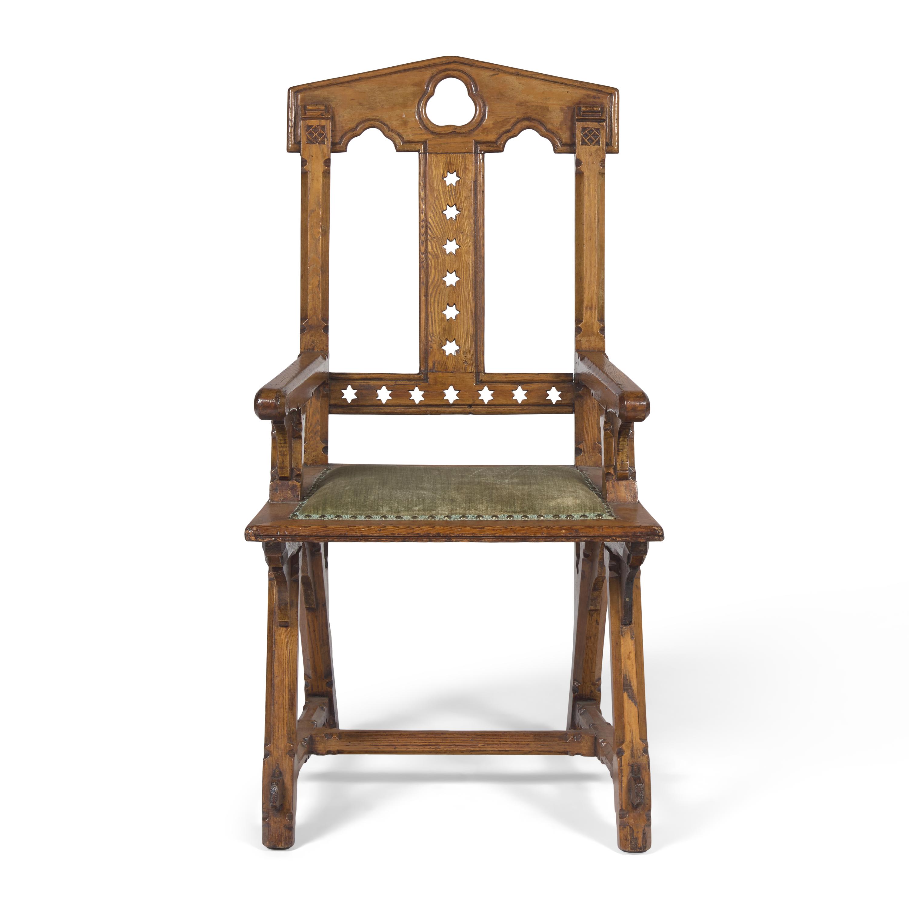 A Gothic Revival Patent Gothic Star Walnut Arm Chair