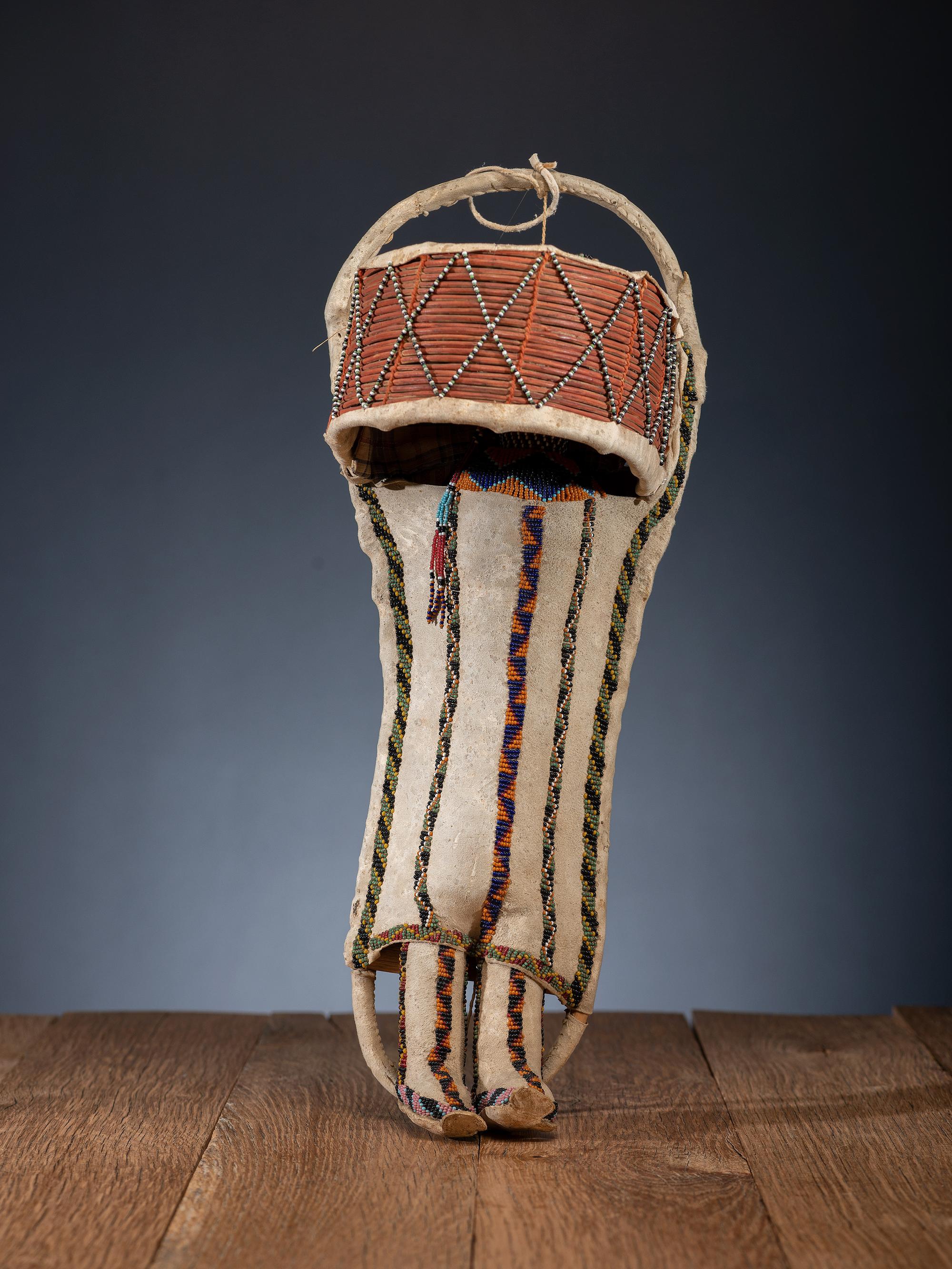 Apache Beaded Hide Cradle, with Doll