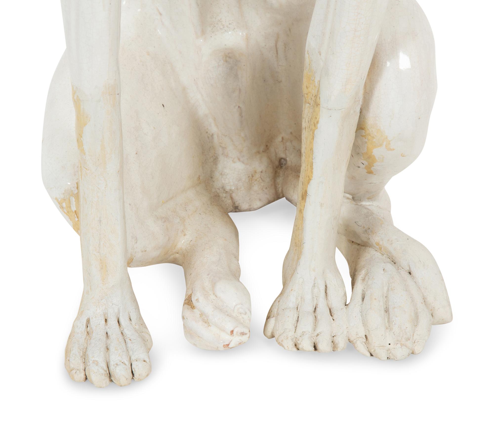 An Italian Glazed Earthenware Greyhound