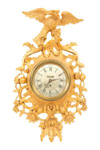 A George III Carved Giltwood Cartel Clock