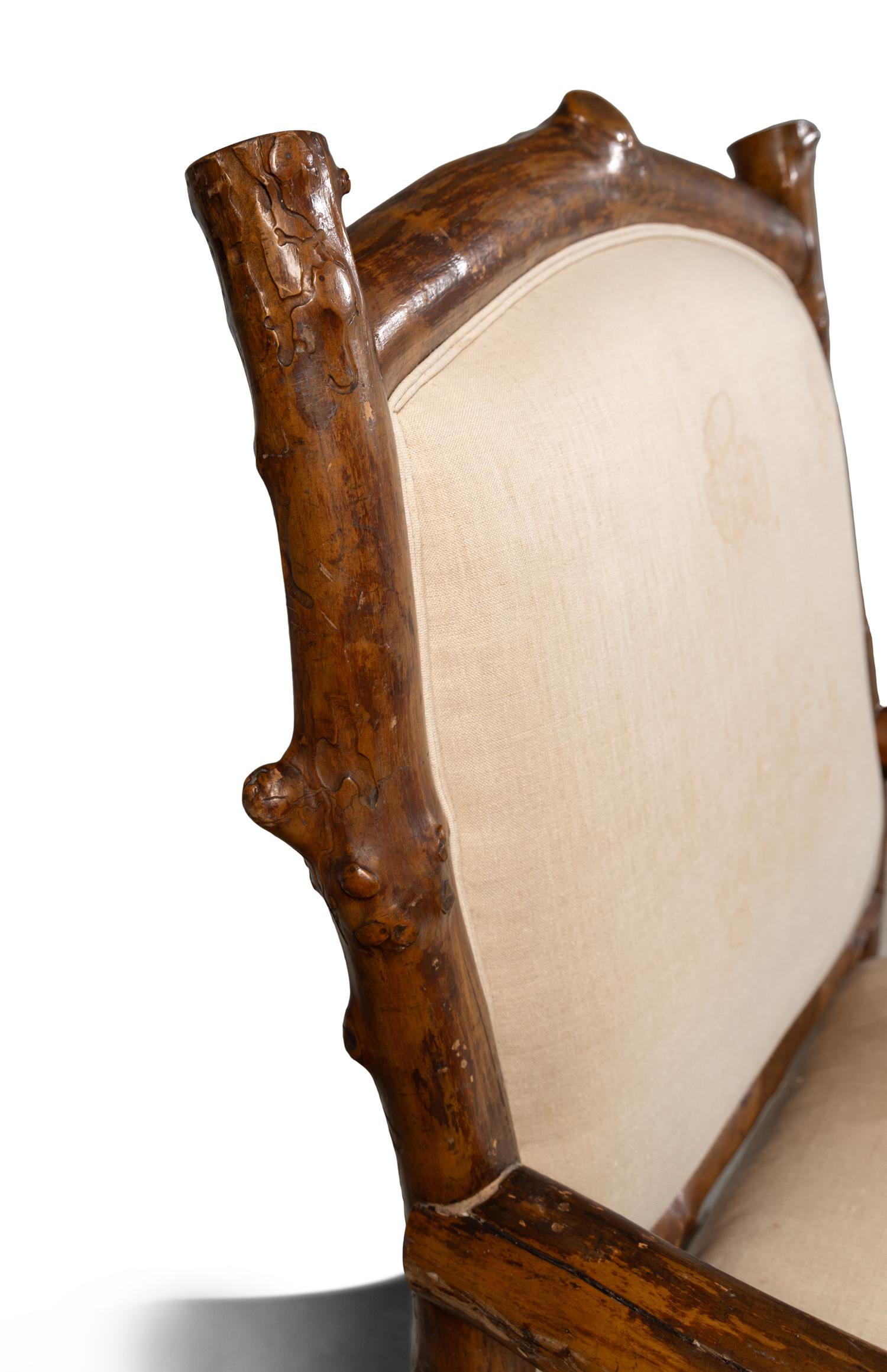 A Group of Three Rustic Wood Chairs