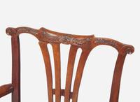 A Chippendale Carved Walnut and Elm Armchair