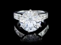 A Fine Platinum and Round Brilliant Cut Diamond Ring, 6.60 dwts.