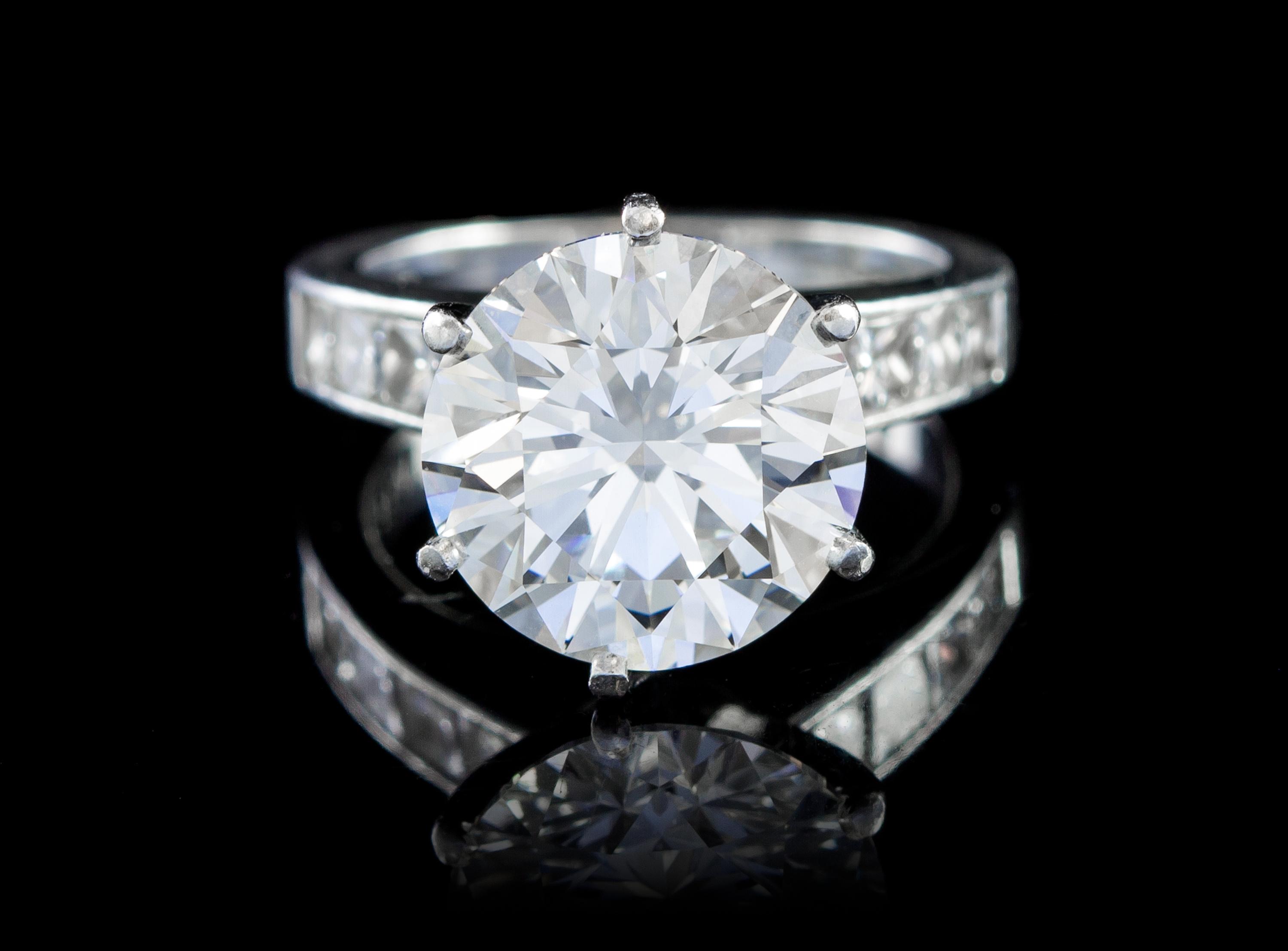 A Fine Platinum and Round Brilliant Cut Diamond Ring, 6.60 dwts.