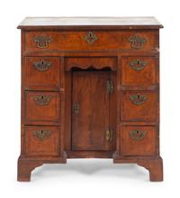 A George II Walnut Kneehole Desk