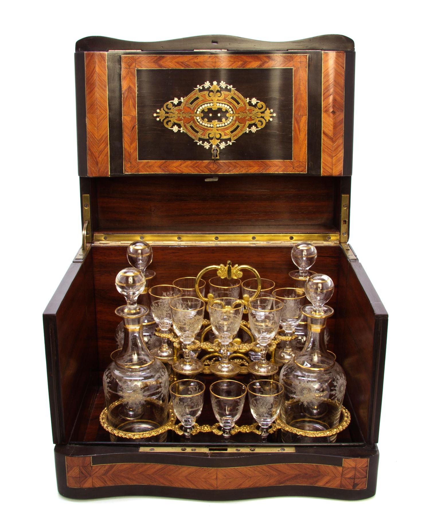 A Continental Parquetry and Marquetry Inlaid Mahogany Cave a Liqueur, Width 13 inches.