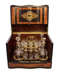 A Continental Parquetry and Marquetry Inlaid Mahogany Cave a Liqueur, Width 13 inches.
