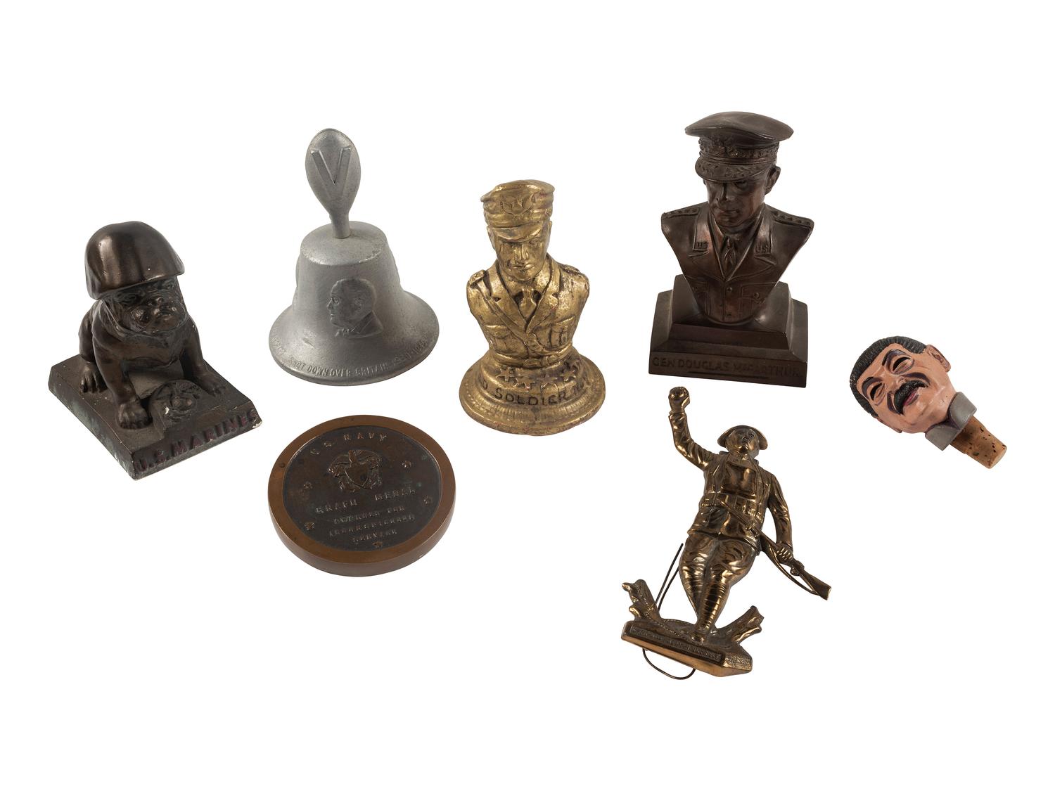[WORLD WAR II]. A group of souvenirs including trench art and Douglas MacArthur commemorative items.
