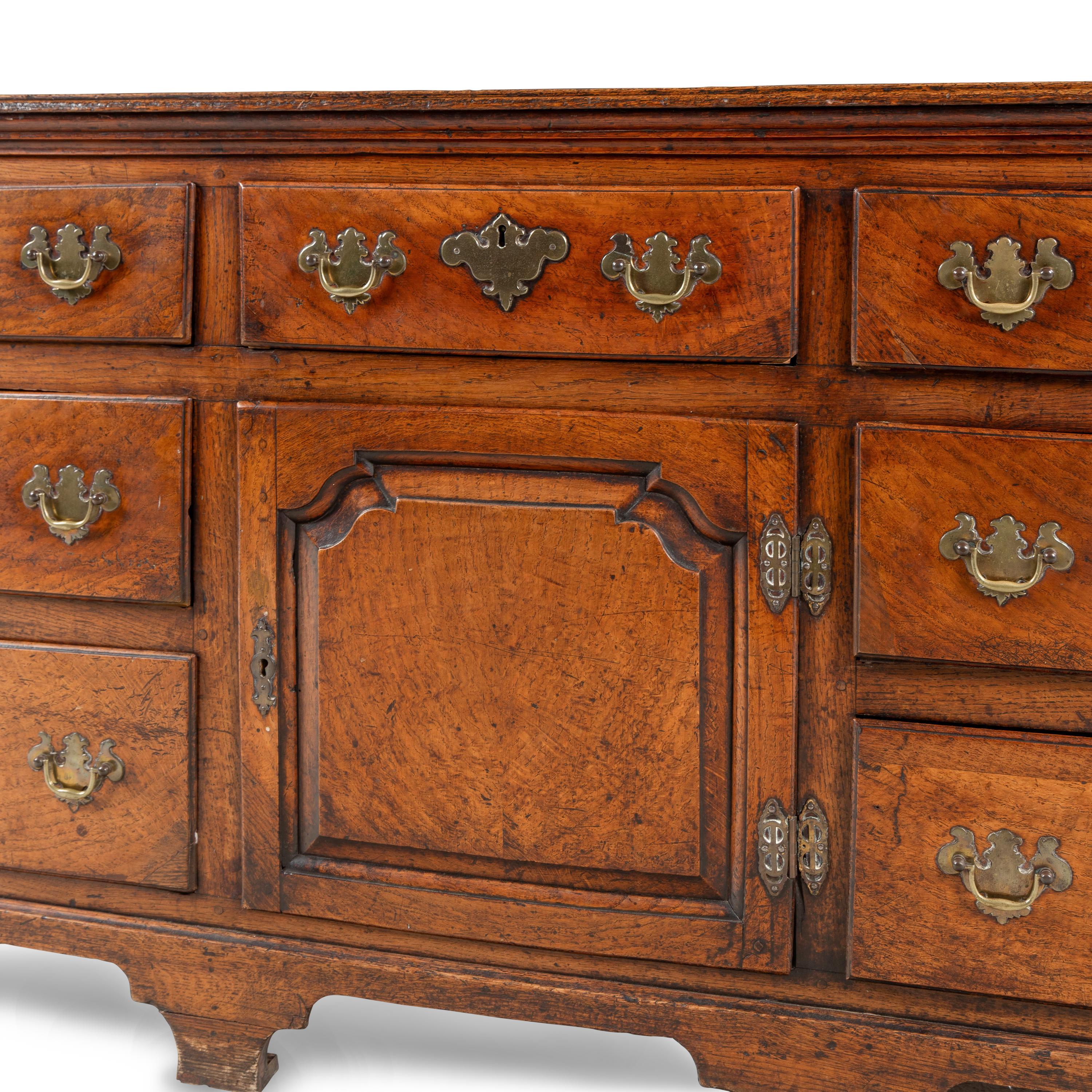 A George III Oak Serving Cabinet