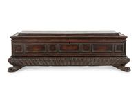 An Italian Carved Walnut Cassone