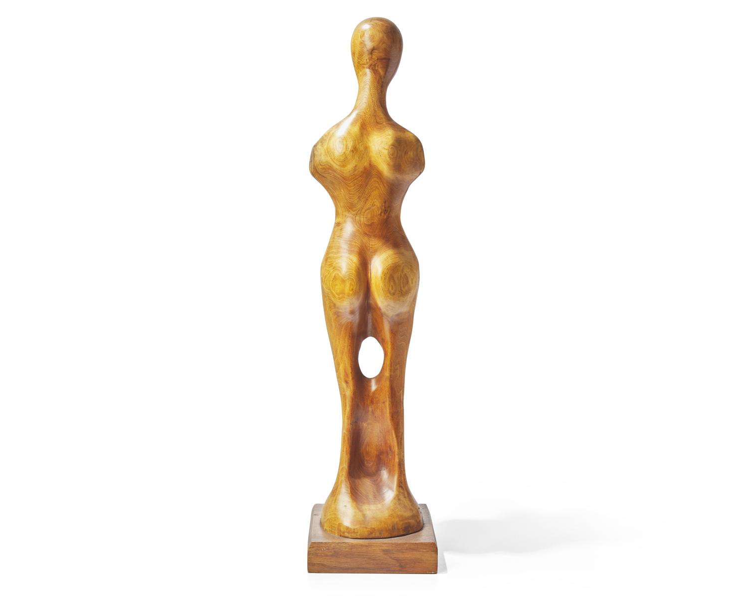 Tom Bazis (b. 1943), A wood carving of a female figure
