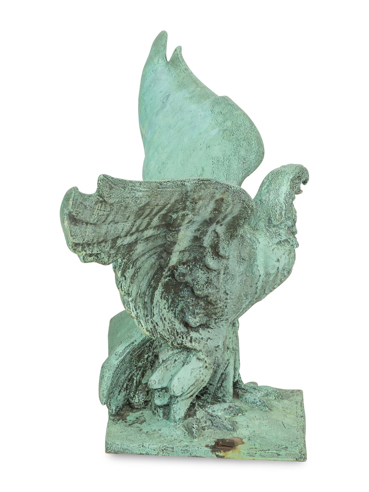 A Patinated Cast Metal Eagle Architectural Ornament with Verdigris Patina