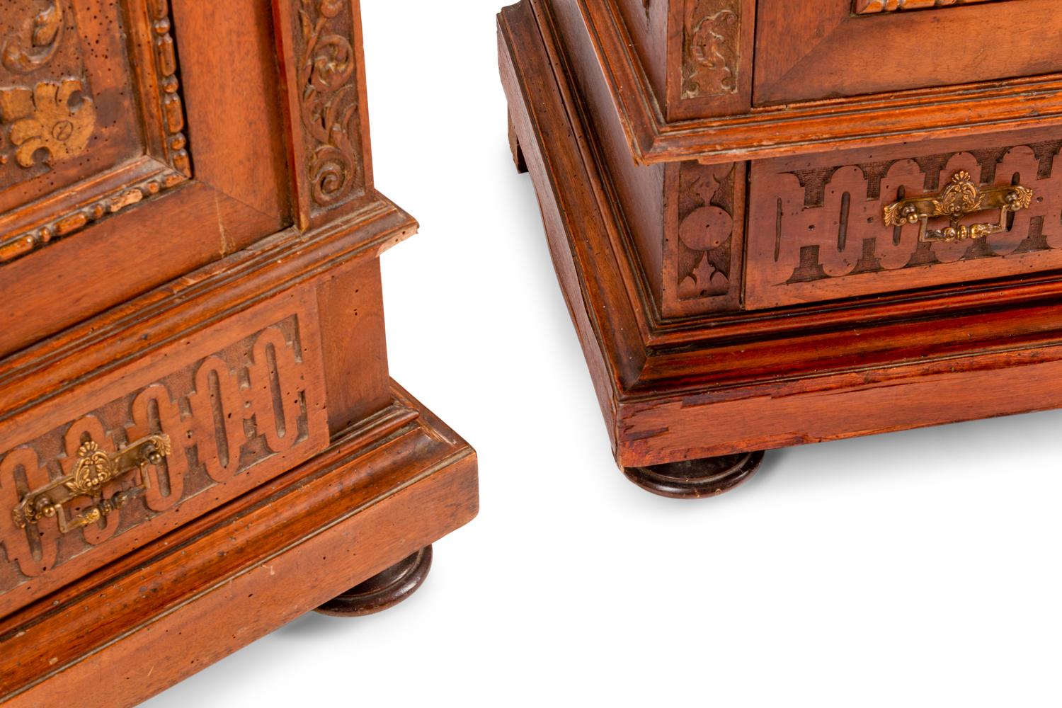A Pair of French Renaissance Revival Parcel Gilt Cabinets