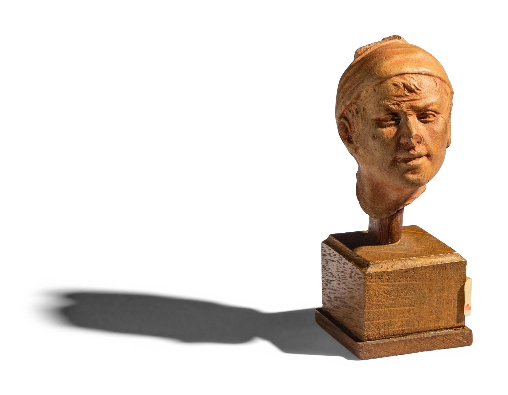 An Etruscan Terracotta Head of a Man