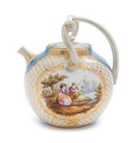A Continental Porcelain Teapot Height 9 inches.