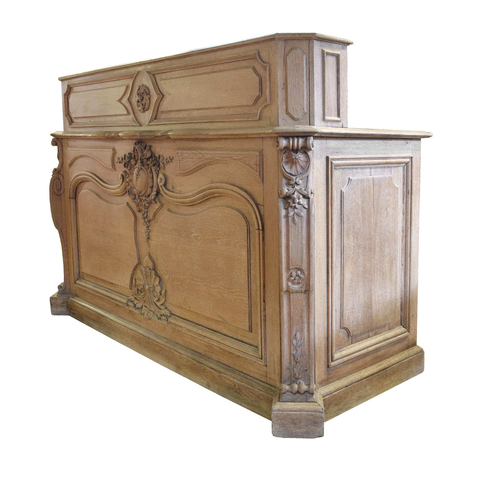 A Carved Oak Shop Counter 73.5" W x 31" D x 51.5" H — France, Late 19th Century