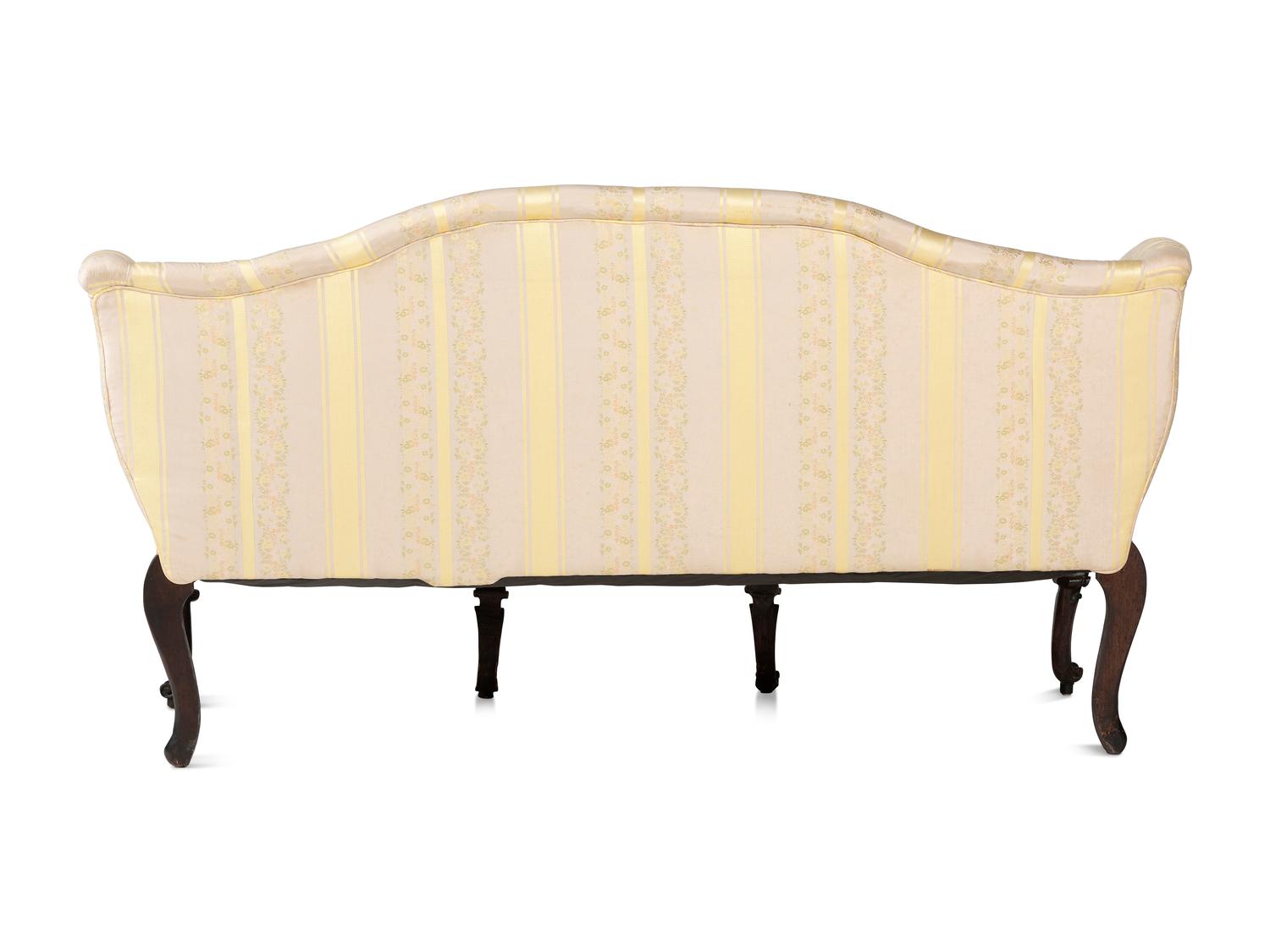 An Italian Carved and Black Painted Walnut Upholstered Sofa