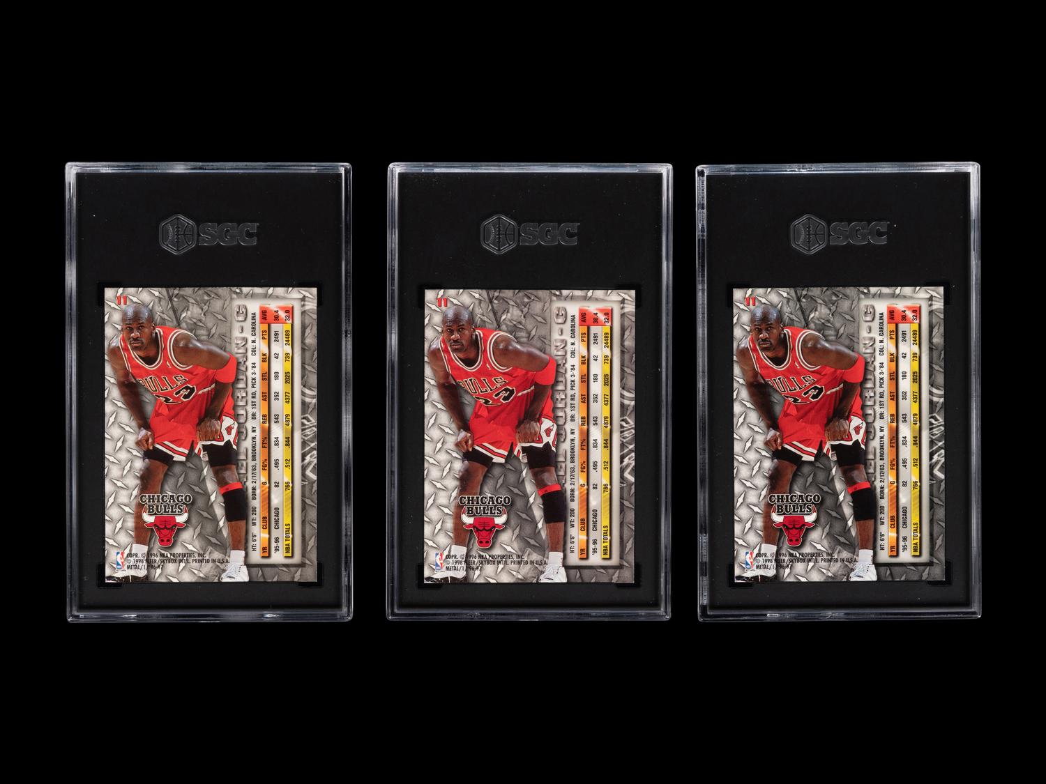 A Group of Three 1996-97 Fleer Metal Michael Jordan Basketball Cards No. 11 (SGC 9.5 MT+)