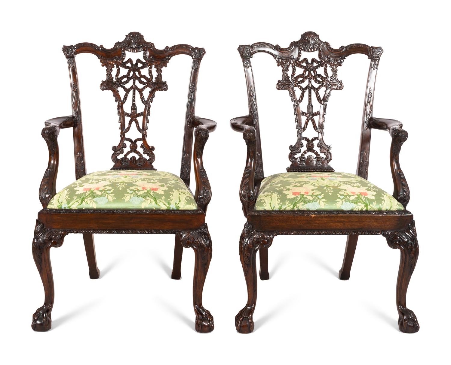 A Pair of George III Style Ribbon-Carved Mahogany Armchairs