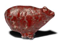 An Egyptian Red Jasper Trussed Ox