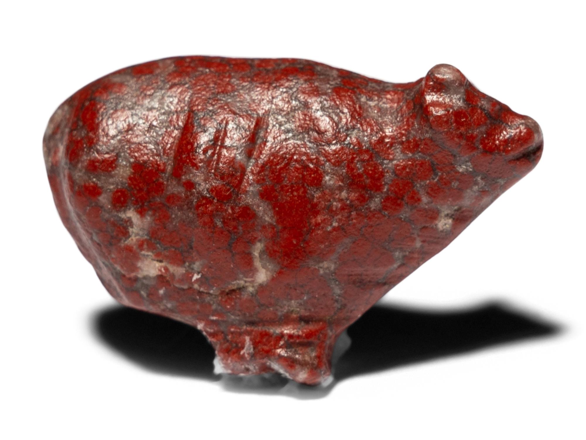 An Egyptian Red Jasper Trussed Ox