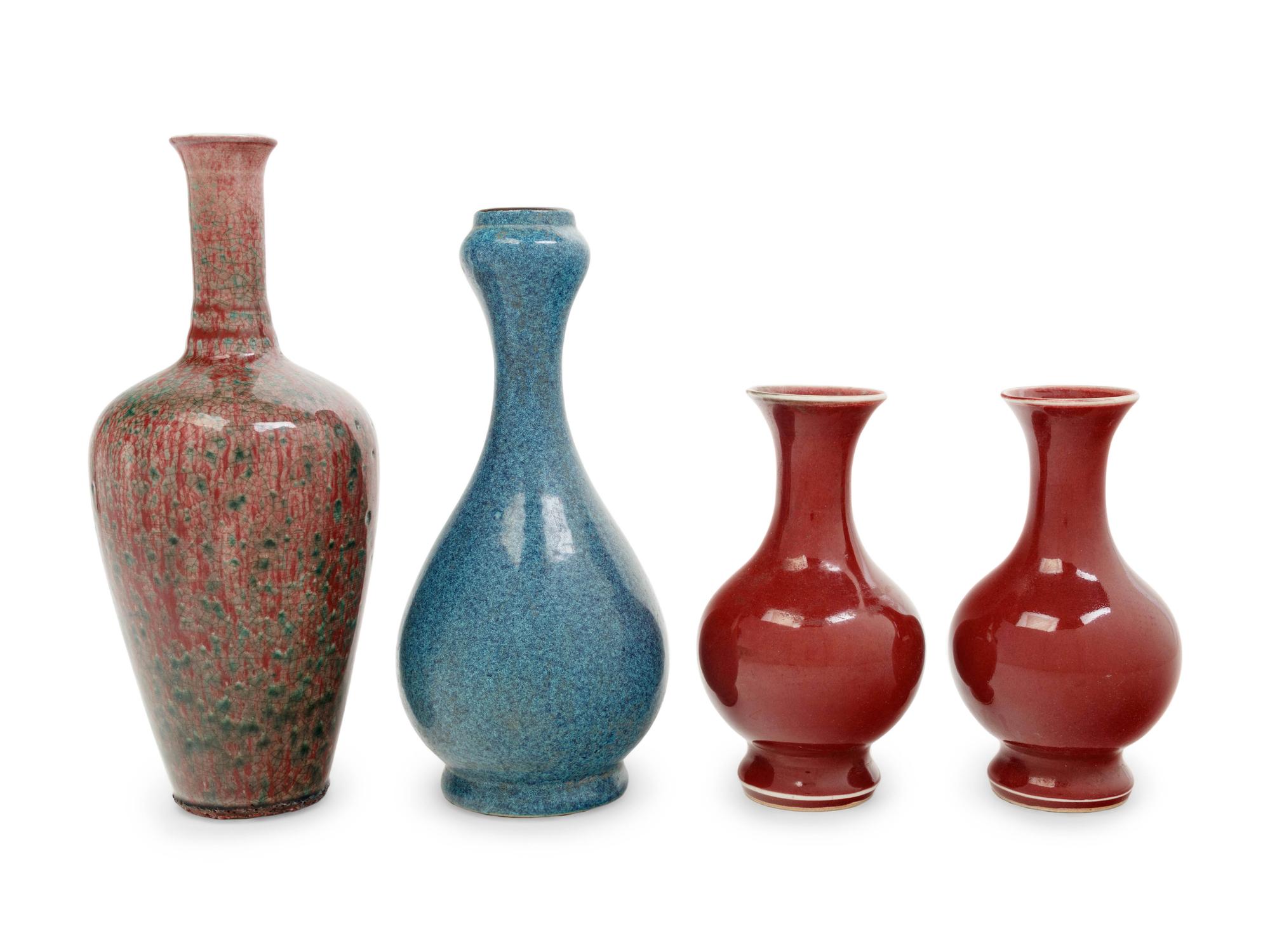 Four Chinese Monochrome Glazed Porcelain Bottle Vases