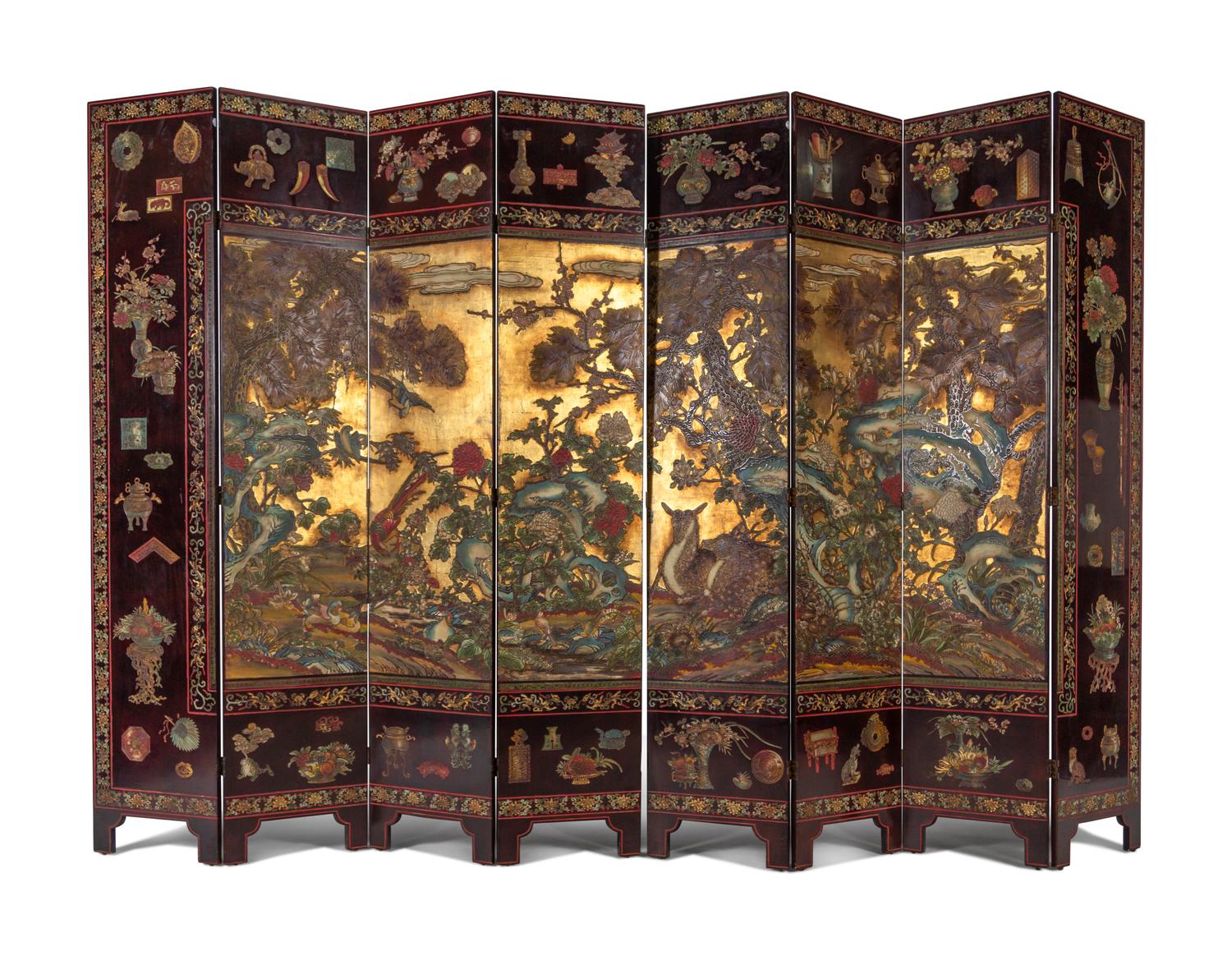 A Coromandel Lacquer Eight-Panel Floor Screen