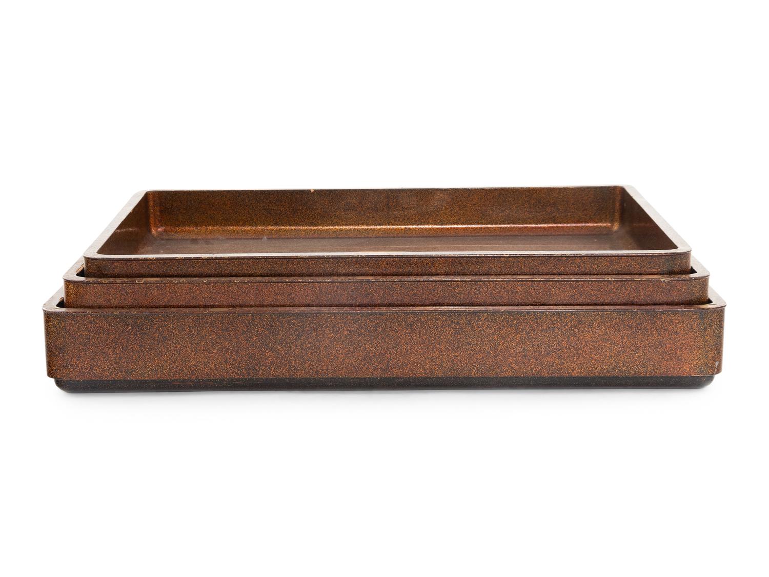 A Set of Three Japanese Maki-e Lacquered Rectangular Trays