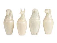 A Set of Four Modern Egyptian Alabaster Canopic Jars