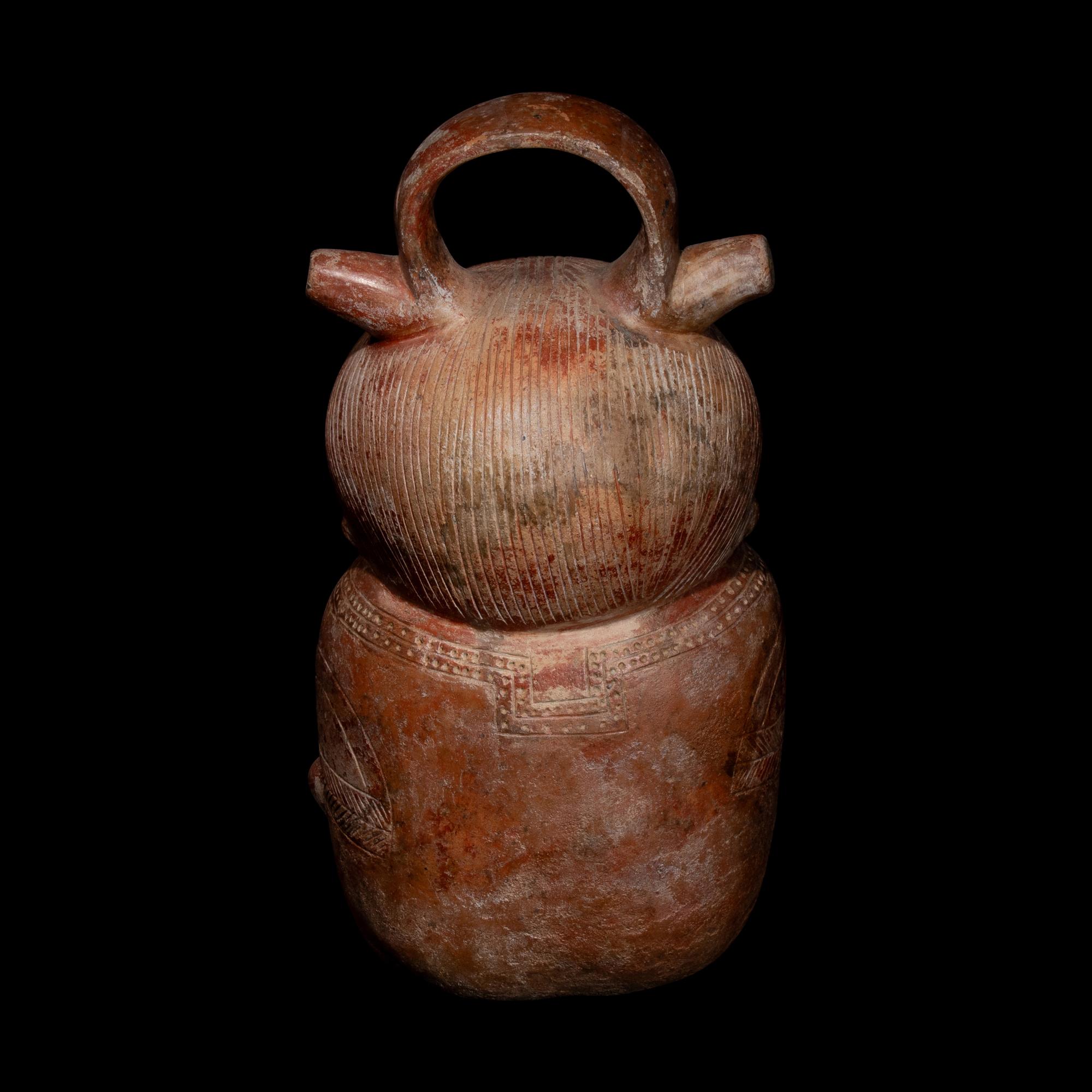 A Calima Redware Anthropomorphic Alcarraza