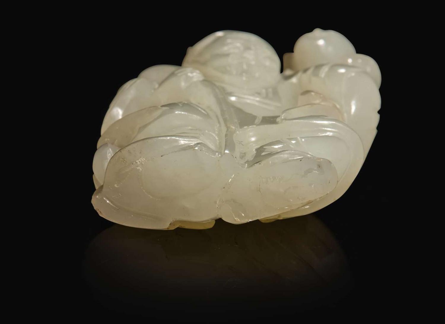 A Chinese white jade figural group with carved hardwood stand 白玉人物與木座