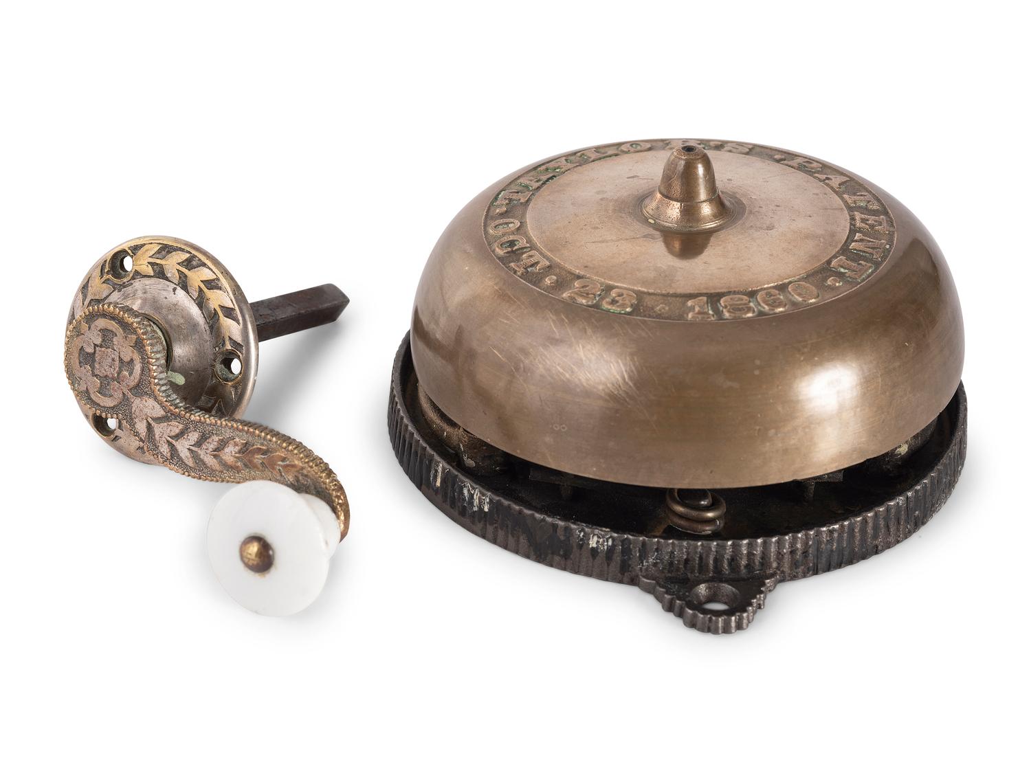 A Brass and Cast Iron Hand-Crank Door Bell