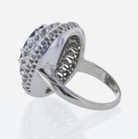 A 14K White Gold, Sapphire, and Diamond Ring