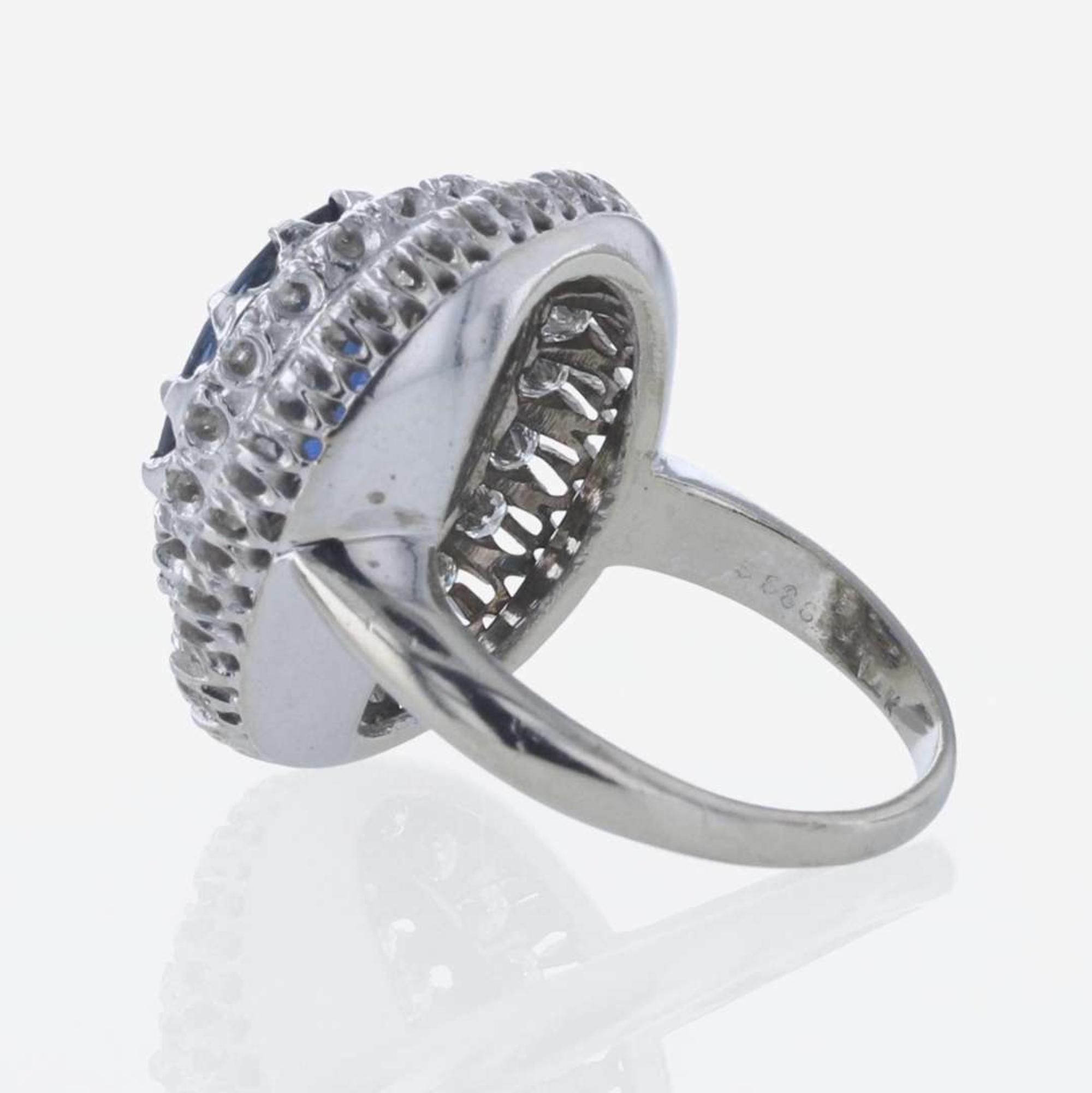 A 14K White Gold, Sapphire, and Diamond Ring