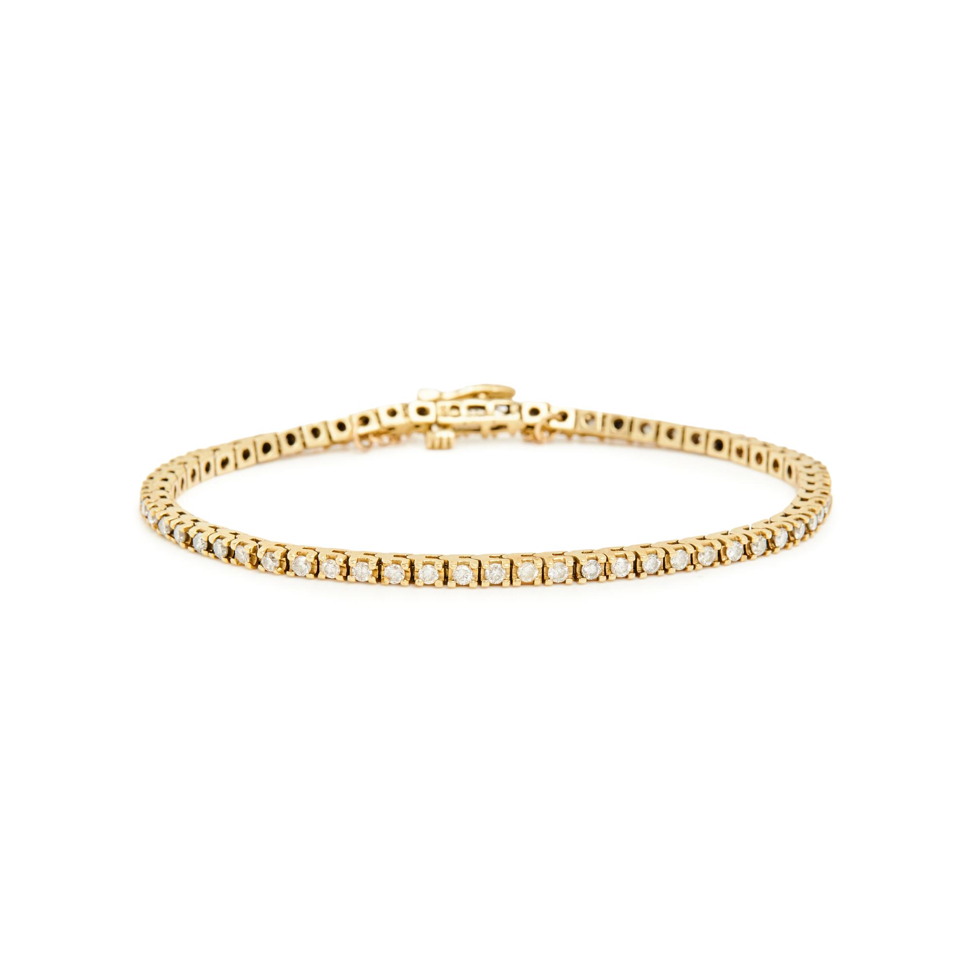 PAIR OF YELLOW GOLD AND DIAMOND LINE BRACELETS
