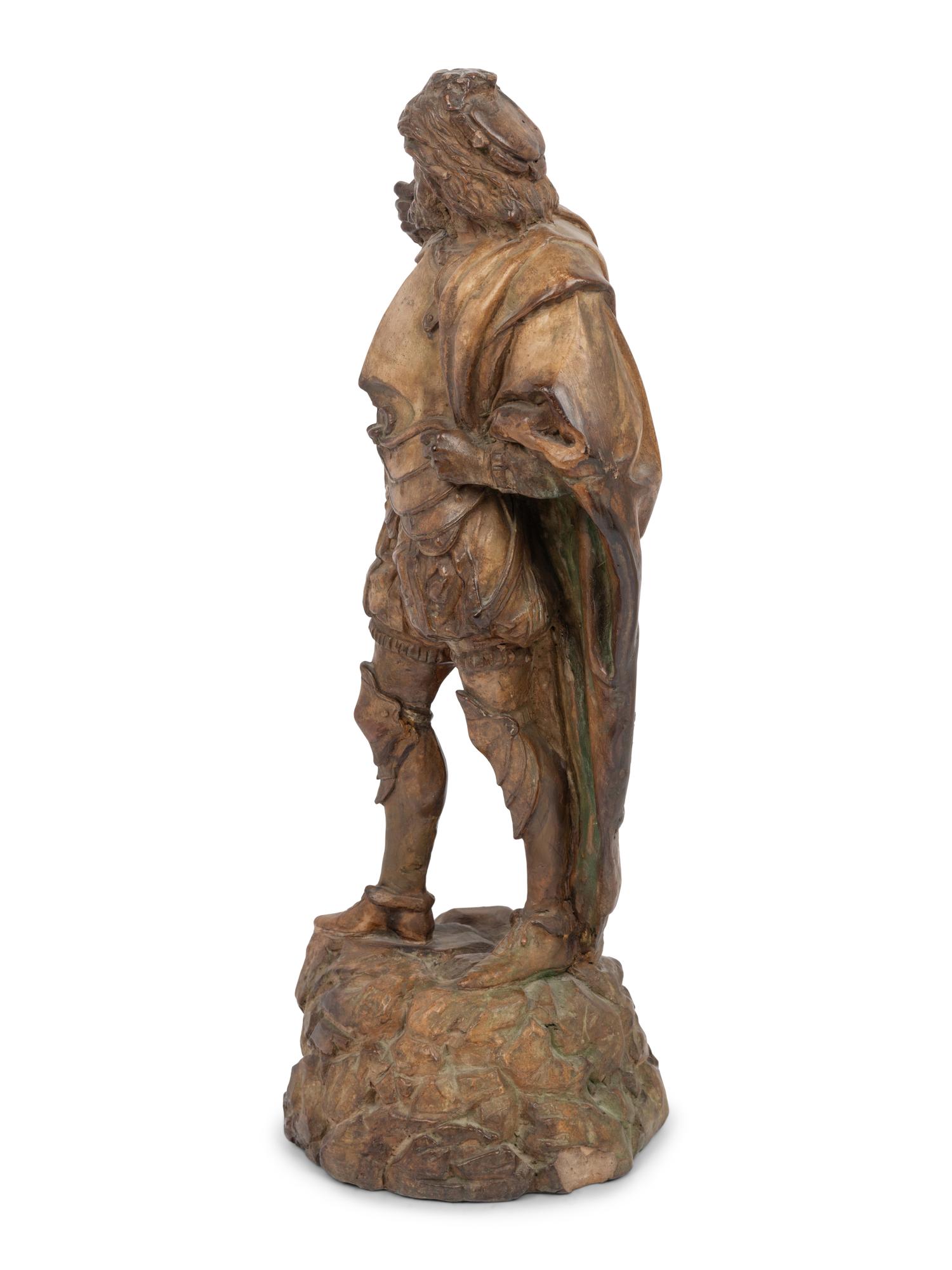 A Continental Terra Cotta Figure of a Cavalier