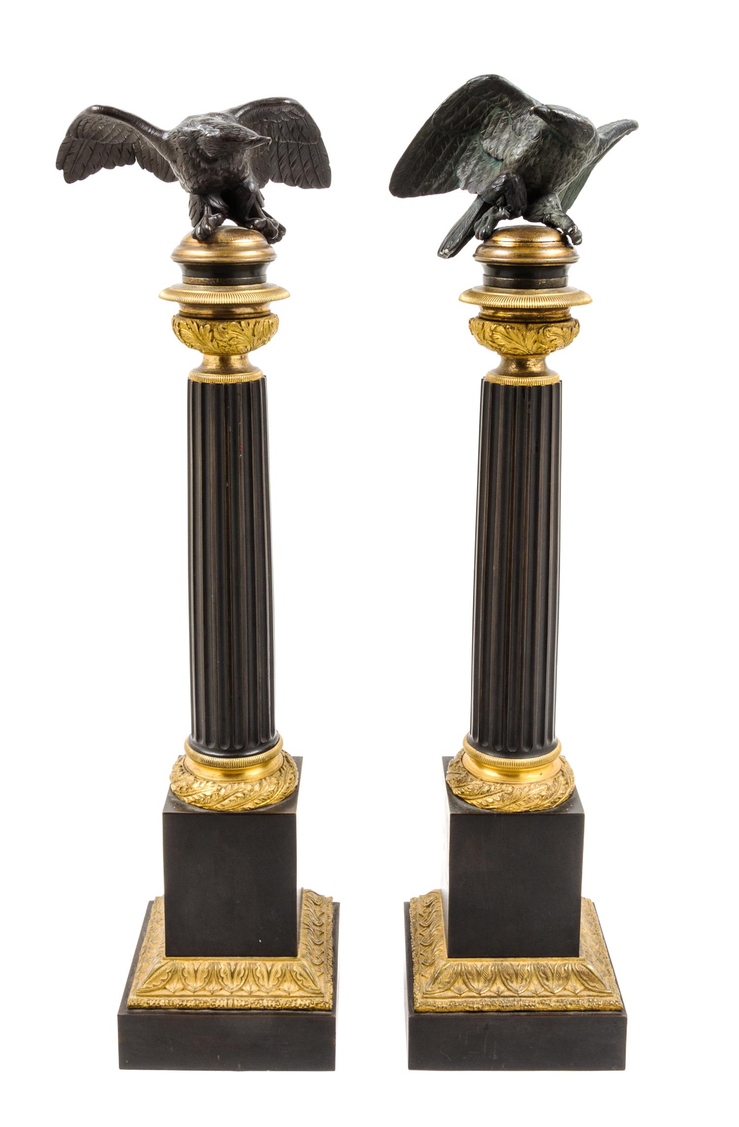 A Pair of Empire Gilt and Patinated Bronze Ornaments Height 25 1/2 inches. — 19TH CENTURY